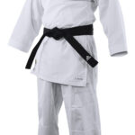 KUMITE FIGHTER' suit designed for experienced kumite competitors. Made of lightweight, supple, comfortable polyester fabric. Ventilation areas in between legs and at the back of the jacket, using Climacool technology, which provides ventilation and regulates temperature and perspiration thanks to highly efficient materials that optimize performance. Trousers with full-length gusset and elastic waist. Soft elasticated waist material located inside the pants for an optimal tightening. Minimal shrinkage, quick drying fabric. Nice finish with elegant stitching's at back of jacket. New soft lining is printed in sublimation and silver color at the inside part and at the top side of jacket. Official WKF decoration with nice silver embroidered adidas logo on chest and at back of jacket, plus < WKF > woven patch at low part of jacket and at pants.