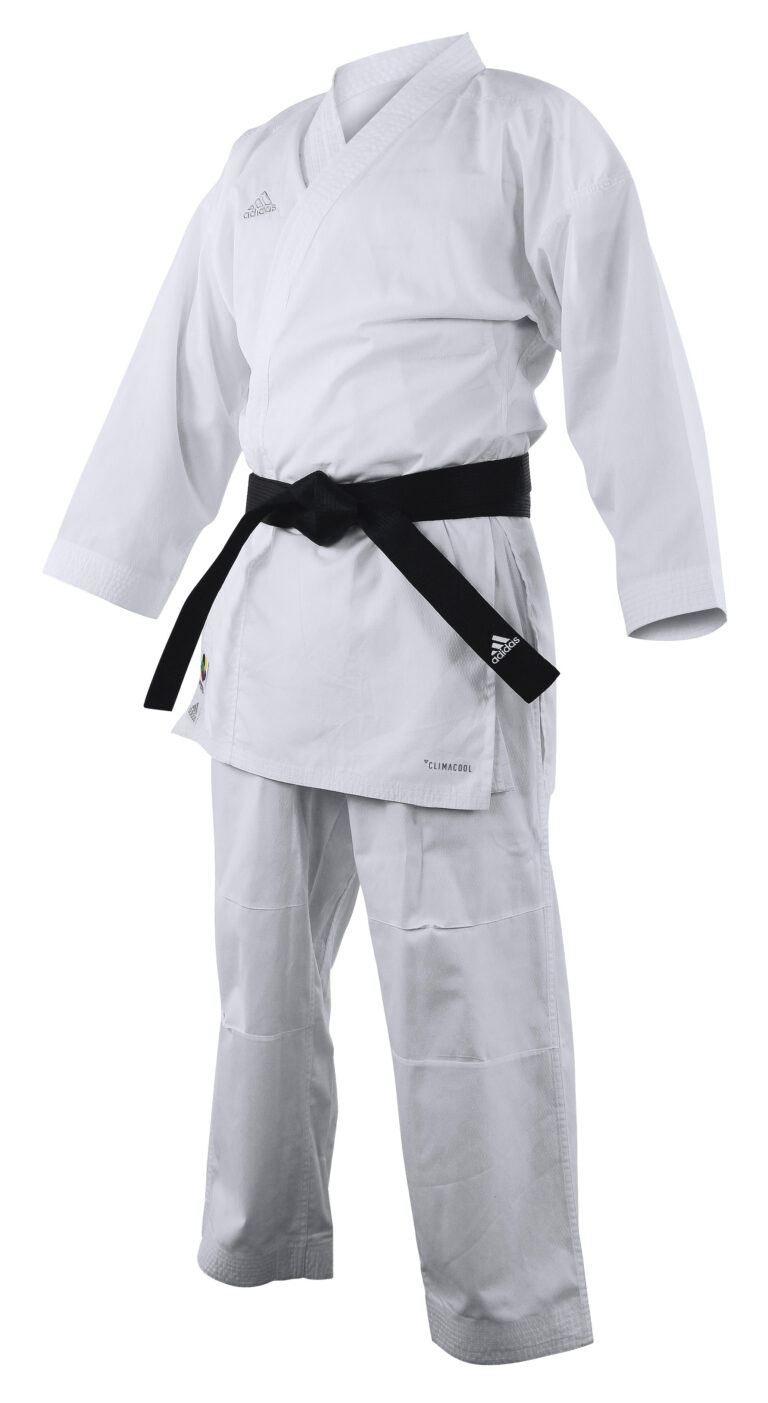 KUMITE FIGHTER' suit designed for experienced kumite competitors. Made of lightweight, supple, comfortable polyester fabric. Ventilation areas in between legs and at the back of the jacket, using Climacool technology, which provides ventilation and regulates temperature and perspiration thanks to highly efficient materials that optimize performance. Trousers with full-length gusset and elastic waist. Soft elasticated waist material located inside the pants for an optimal tightening. Minimal shrinkage, quick drying fabric. Nice finish with elegant stitching's at back of jacket. New soft lining is printed in sublimation and silver color at the inside part and at the top side of jacket. Official WKF decoration with nice silver embroidered adidas logo on chest and at back of jacket, plus < WKF > woven patch at low part of jacket and at pants.