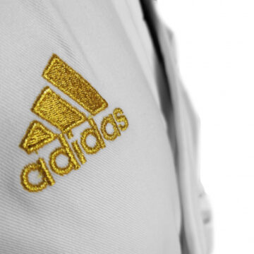 karate uniform with gold logo