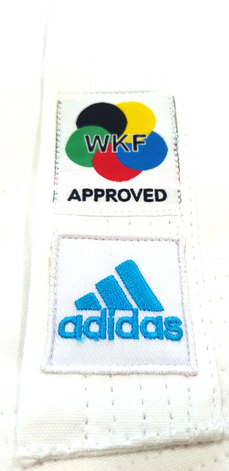 karate uniform with blue logo