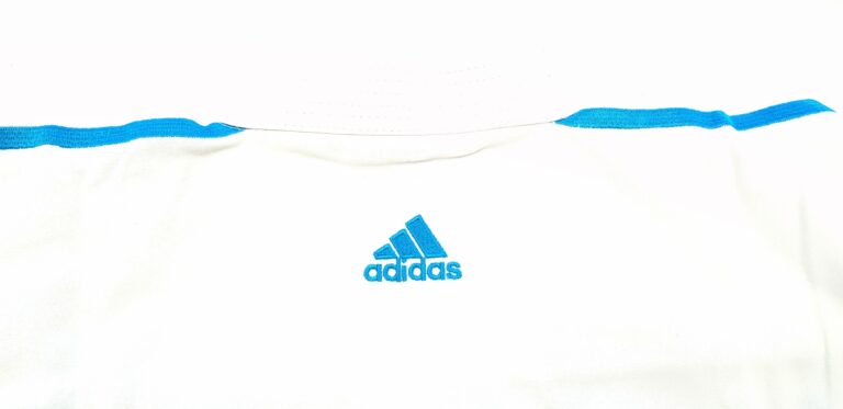 karate uniform with blue logo