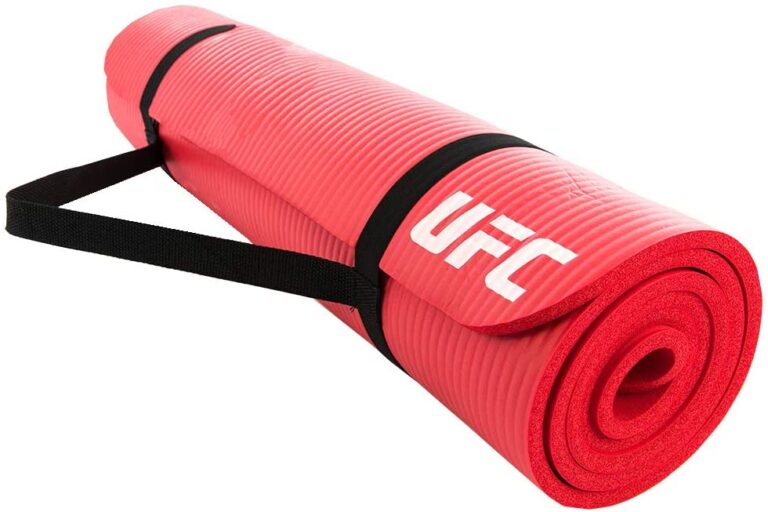 This bold Red UFC training mat is an essential fitness tool perfect for multiple uses. The portability and durability of this mat allow you to work out nearly anywhere at any time and store it when not in use. Helping to provide stability and added cushion, it allows you to comfortably perform numerous exercises including sit-ups, push-ups, burpees, and Planks. The non-slip textured surface, soft yet durable design and convenient carry strap combine for a superior training mat.